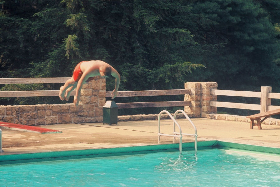 David Bott in flight from the diving board at the swimming pool, circa 1968. | 📸: Leonard Bott