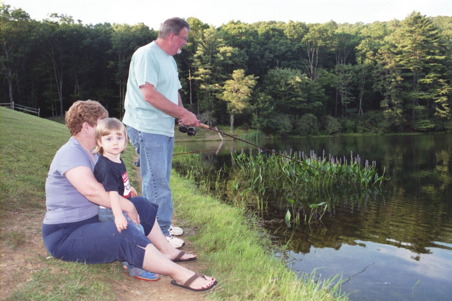 My parents, David and Donna Bott, enjoying a summer day 2007 with their granddaughter, Belle (my daughter), at Watoga Lake. 📸: Rachelle Bott Beckner.