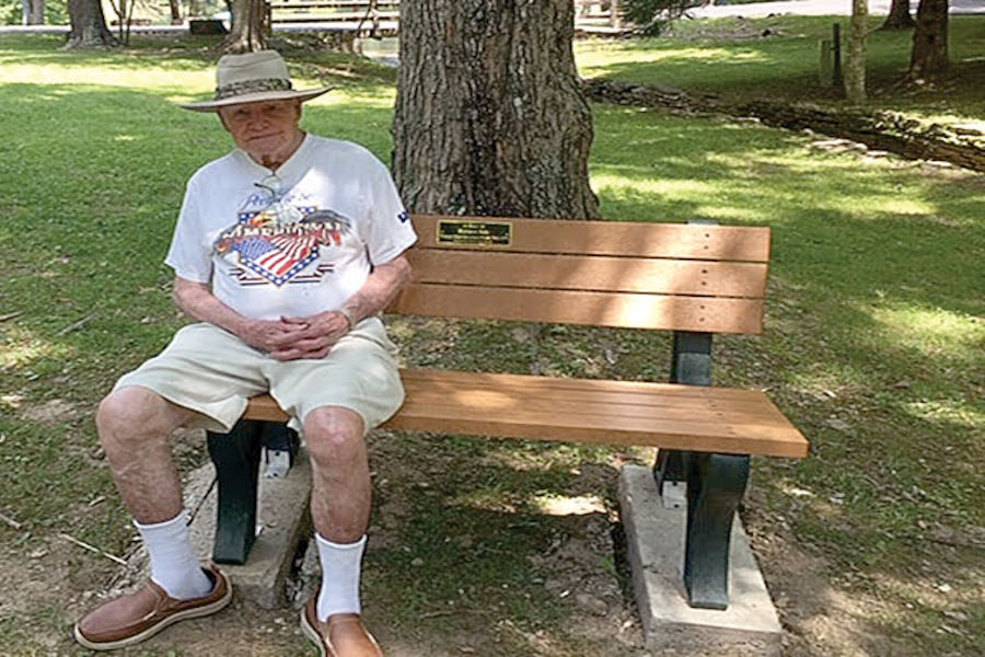 Richard Dale, superintendent at Watoga from 1966-1975, enjoys a sun-filled summer day on his bench. 📸: Rose Clark, June 2020.