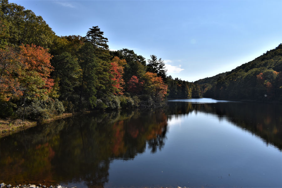 Hues of orange and red signal the beginning of fall at Watoga Lake. 📸: John C. Dean, October 7, 2020.