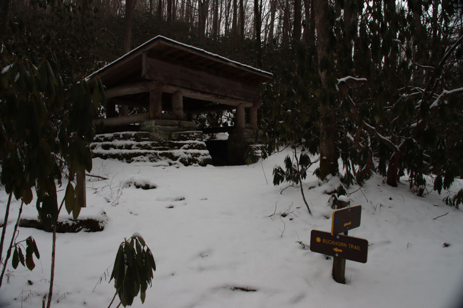 Even though it is an open shelter at the intersection of Buckhorn and Dragon Draft trails, it does provide some relief from the blowing flurries and cold winter air. Photo by Angela Hill©.