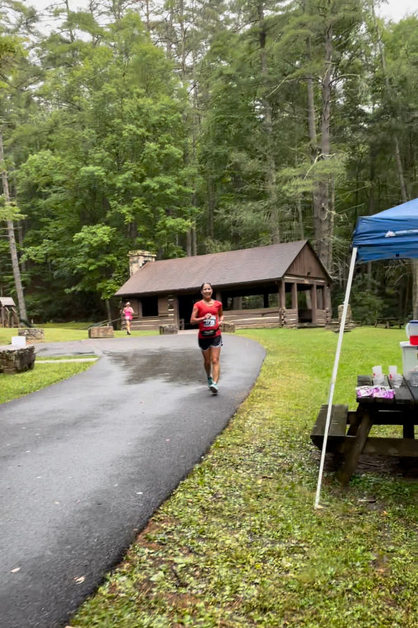 Near the picnic shelter at Watoga State Park, this runner sprints toward an aid station.