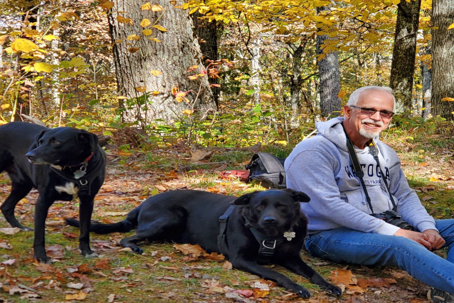 John Dean travels with Jack and Max (standing). Photo by Donna Dilley.