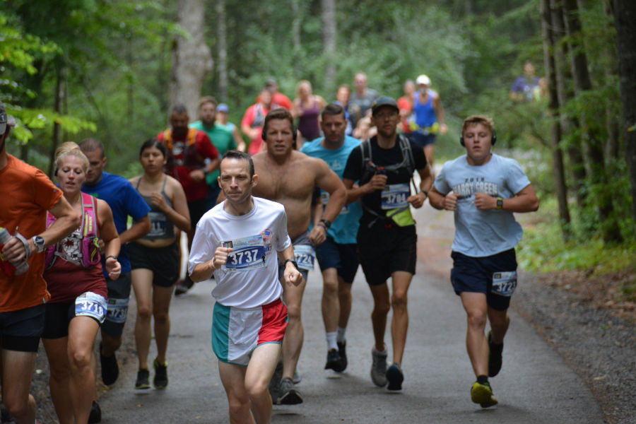 Pastor John Sowers, No. 3737 of the First Christian Church (Disciples of Christ) at "home and at peace" at Watoga's 2021 Mountain Trail Challenge Half-Marathon Race. Photo by Brian Hirt.